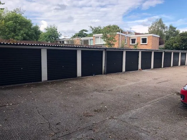 Anthracite grey sectional garage door fitted by Doors 4 Garages Ltd